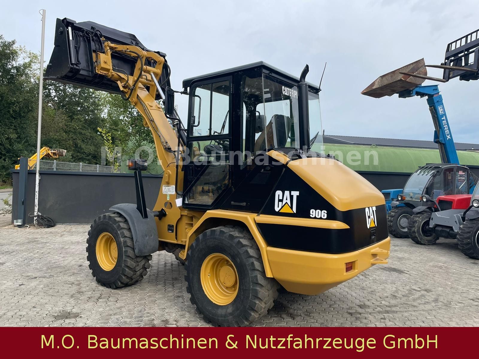 Fahrzeugabbildung CAT 906 / Klappschaufel