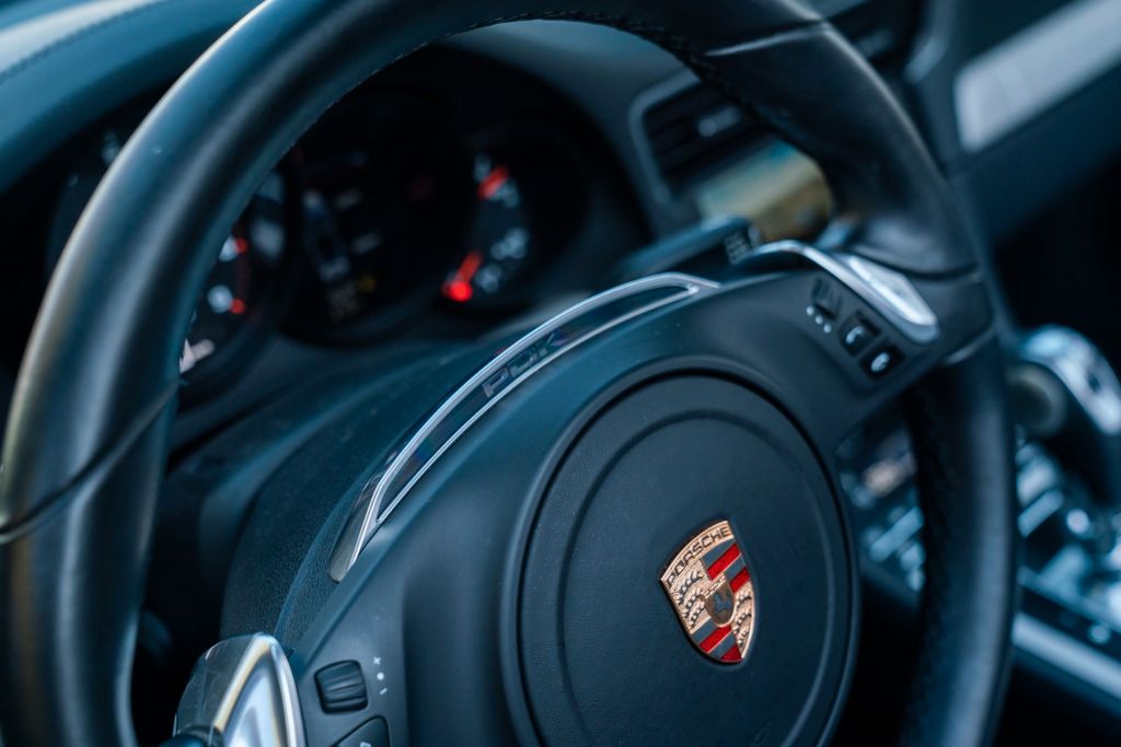 PORSCHE 991 Carrera 4 Cabriolet/ PASM / SPORT AGA / BOSE PORSCHE 991 Carrera 4 Cabriolet/ PASM / SPORT AGA / BOSE