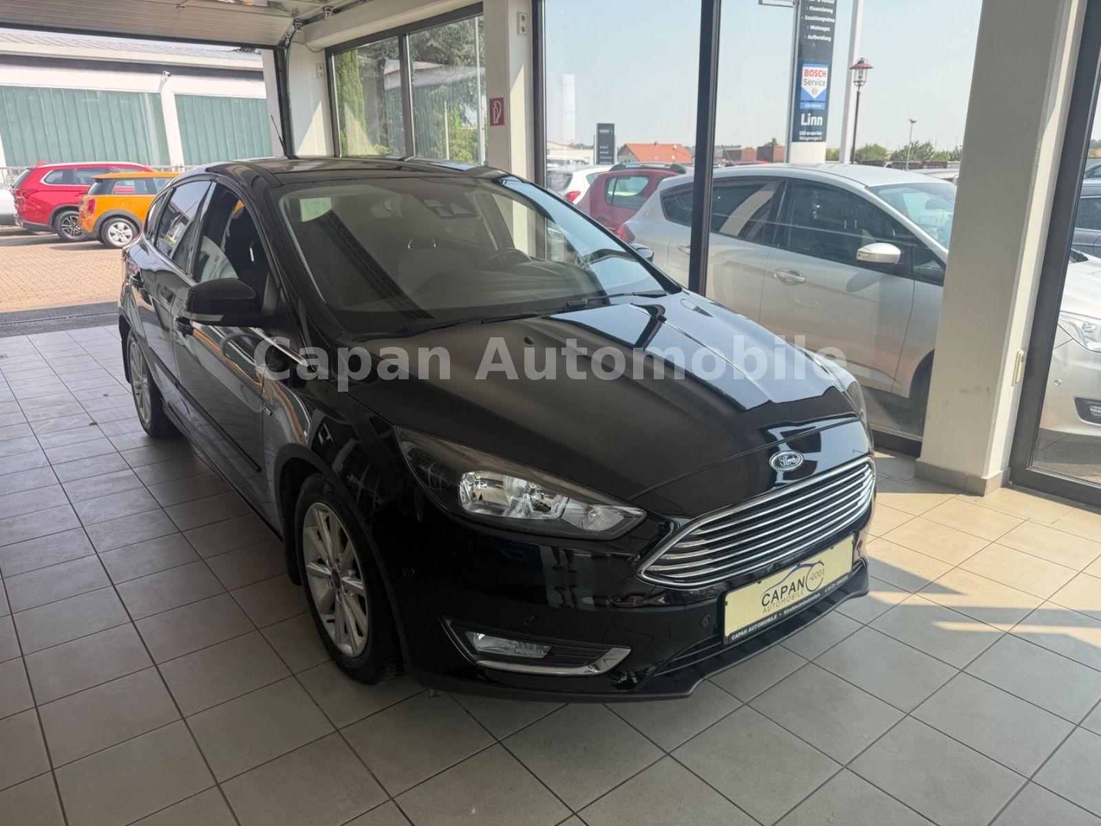 Ford Focus Lim. Titanium Navi/Klima/SHZ/PDC/AHK/EURO6