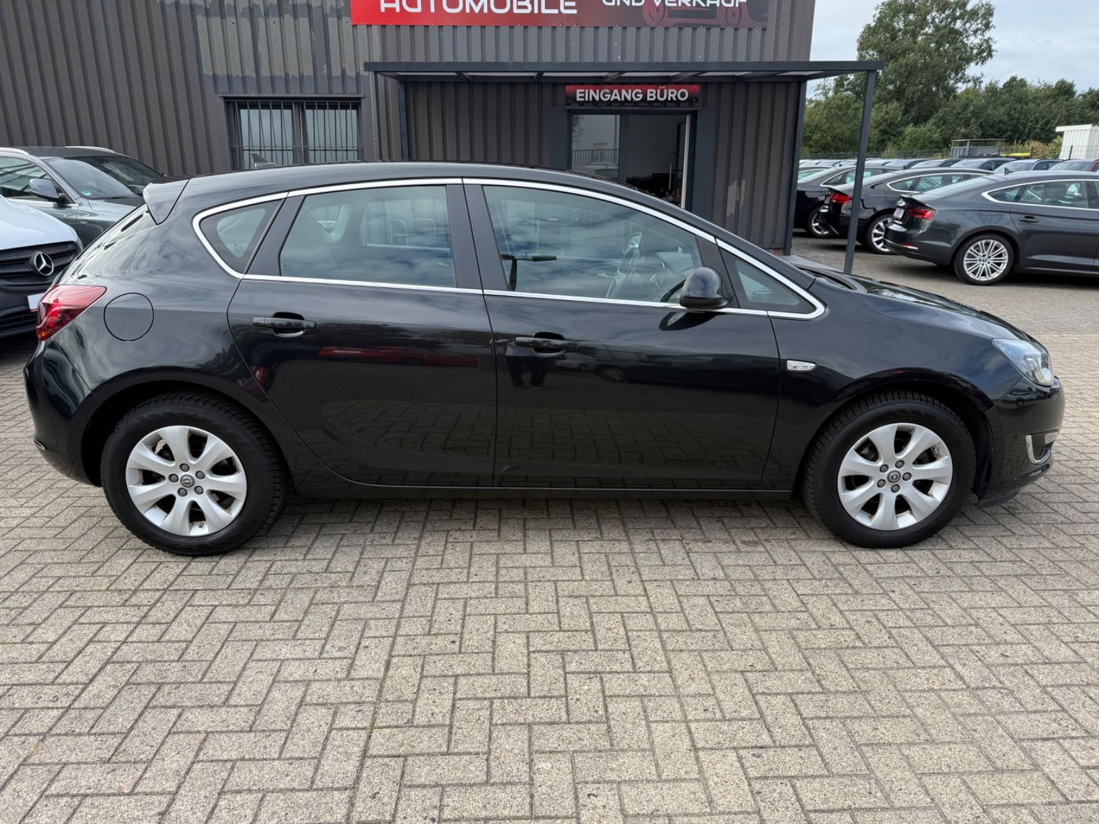 Astra J Lim. 5-trg. Exklusiv*NAVI*1.HAND*SCHECKH