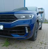Volkswagen T-Roc 2.0 TSI OPF DSG 4MOTION R AHK Pano - mit Benzin-Antrieb: Blau, Luftfederung, Geländewagen