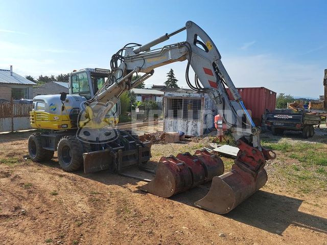 Takeuchi TB 295 W Mobilbagger mit 4 Eimern und Palettenga