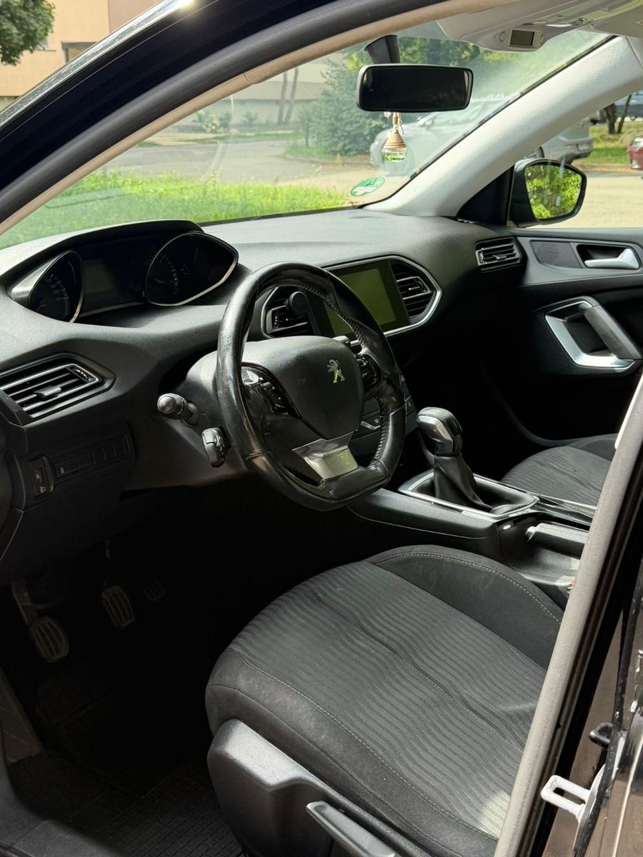 Peugeot 308 2014 — photo 9