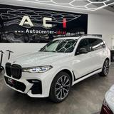 BMW X7 M50i xdrive,Laser,SkyPan.,StH.,AHK.,7-S,HeUp - weiße BMW X7 M50