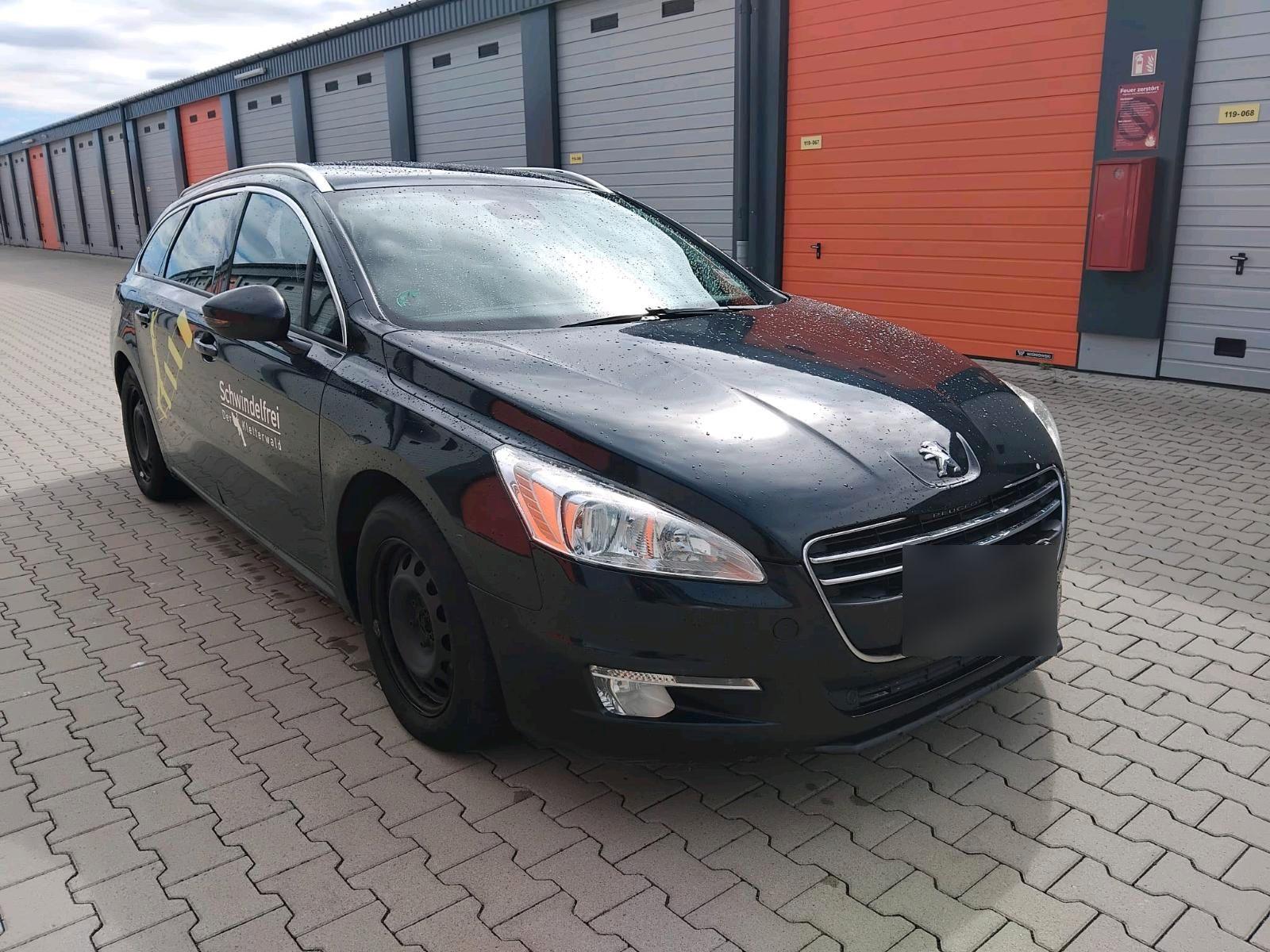 Peugeot 508 2011 — вигляд ззаду