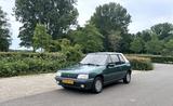 Peugeot 205 Roland Garros-Scheckheft. - Peugeot 205: Cabrio, Roland Garros