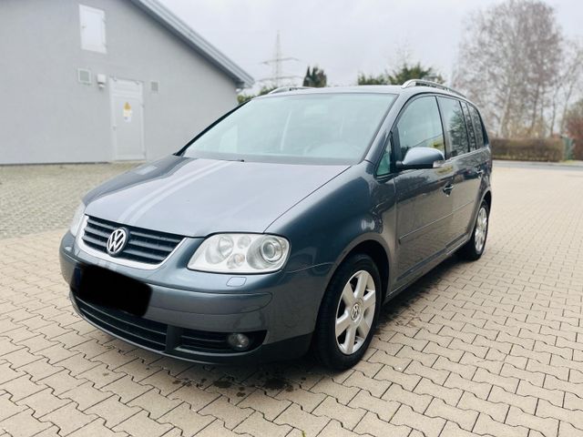 Volkswagen Touran 1.9 TDI DSG Highline 7 Sitzer Vollaust.