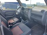 Suzuki Jimny Black and White Lim./Klima/HU 2027 - Suzuki: An
