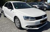Volkswagen Jetta VI Match*TEMPOMAT*PDC*AHK*T-LEDER - gebrauchte VW Jetta aus dem Jahr 2012