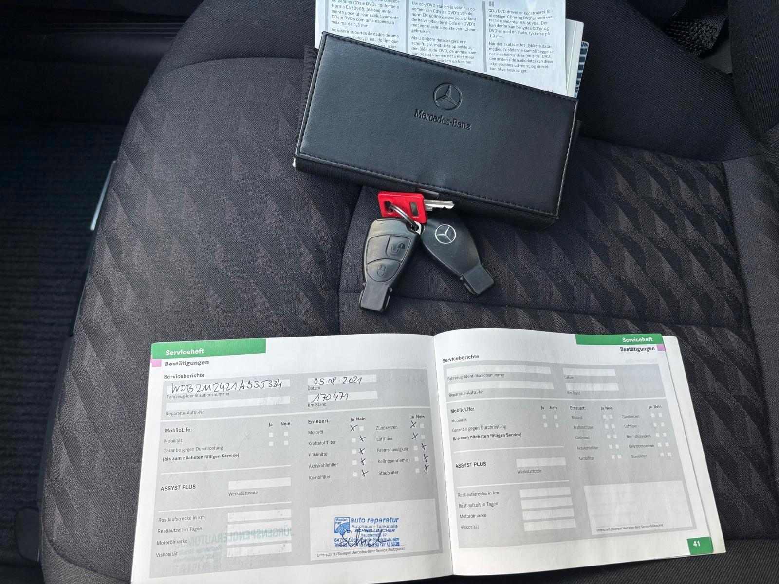 Mercedes-Benz E200 2004 — photo 23