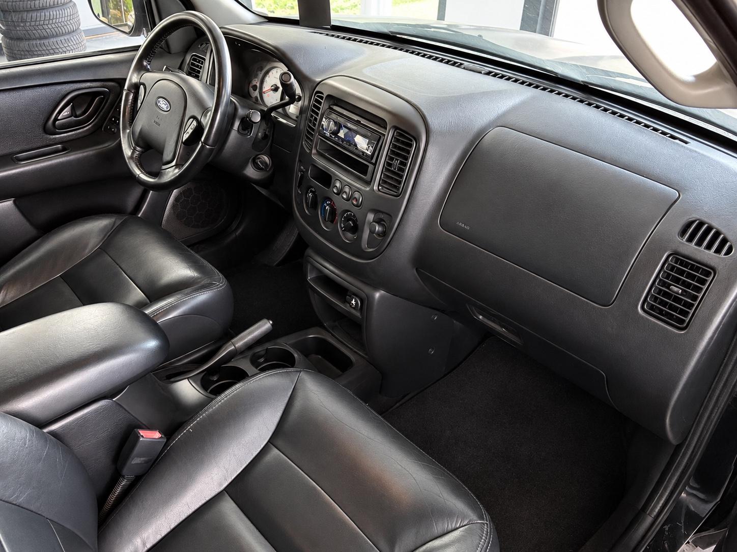 Ford Maverick 2004 — photo 13