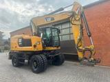CAT M318F - CAT Mobilbagger M318