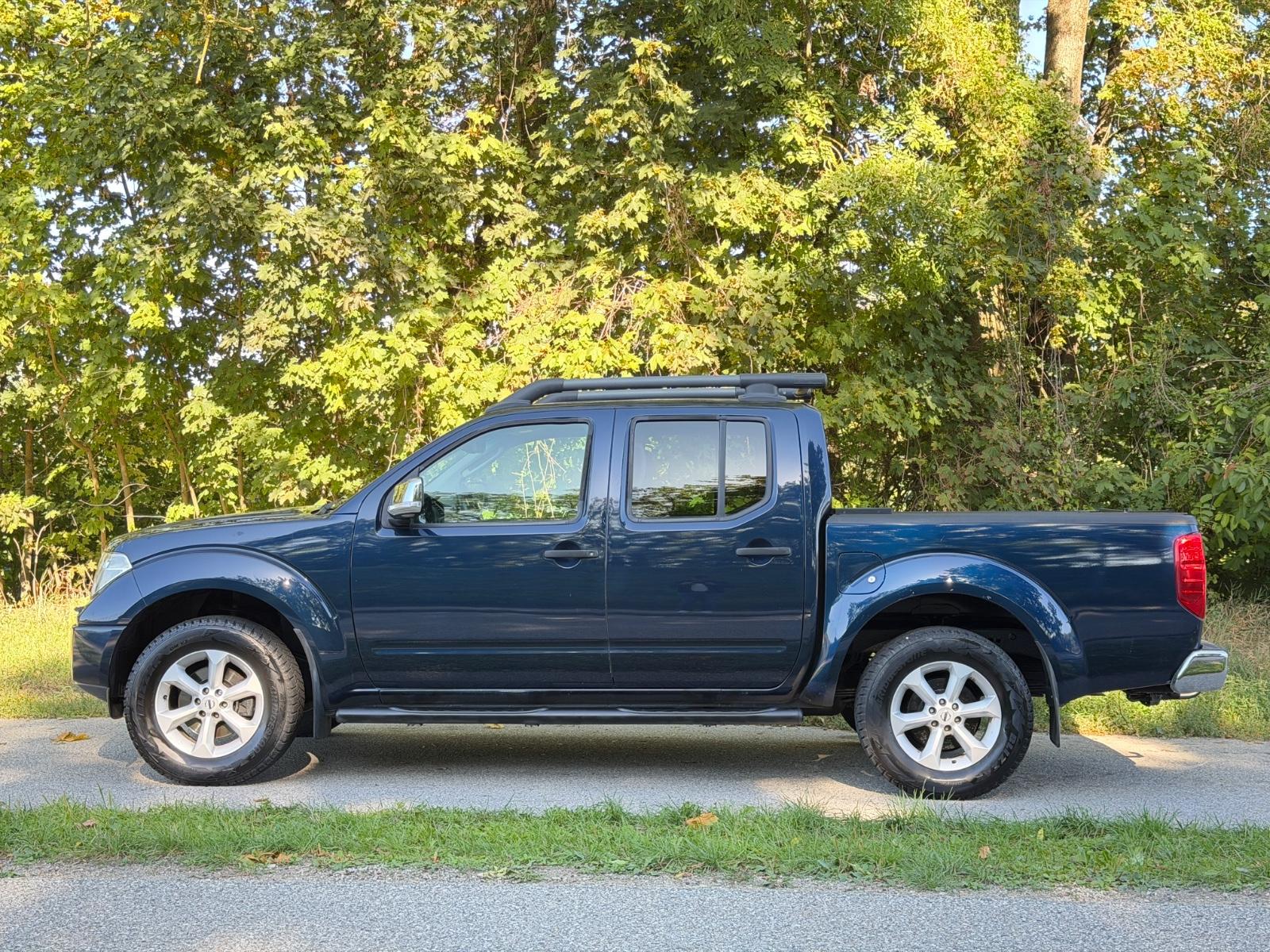 Nissan Navara D40 Double Cab 2.5 dCi 171 ch • BVA • 4x4 • Toit Ouvrant • Sièges chauffants