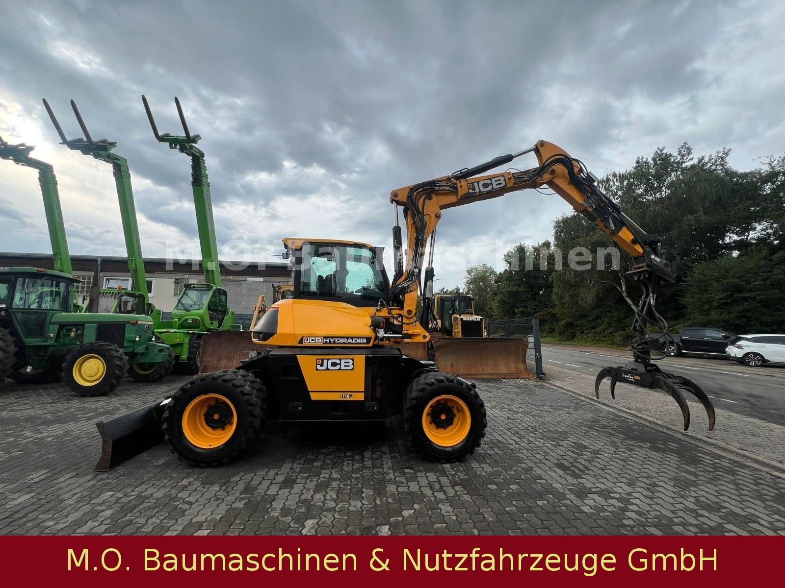 Fahrzeugabbildung JCB 110 W Hydradig / Holzgreifer / 2x Tieflöffel