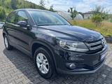 Volkswagen Tiguan 1,4 Trend & Fun BMT-Navi-AHK-TÜV neu - gebrauchte VW Tiguan aus dem Jahr 2011
