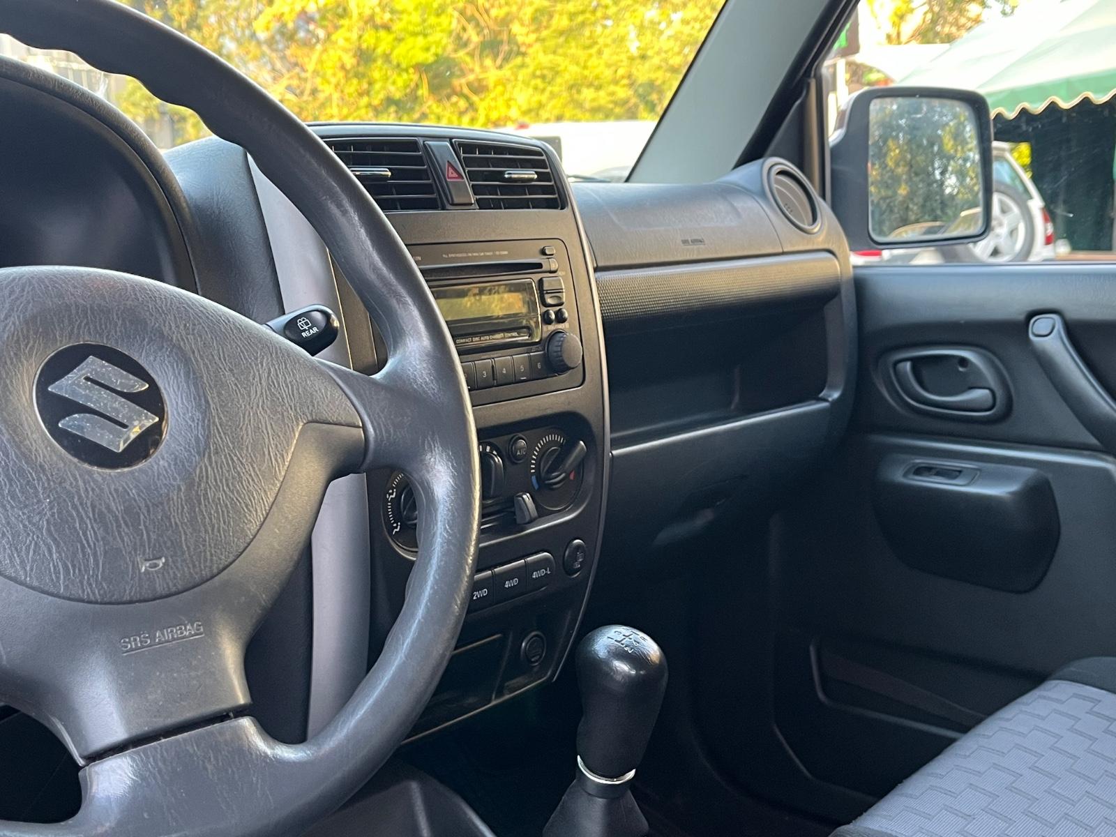 Suzuki Jimny 1.3 VVT 86 ch 4x4 Club • Réducteur • Clim • Attelage • Sièges chauffants - Pack Hiver