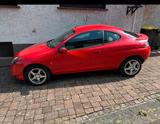 Ford Roter Ford Puma - gebrauchte Ford Puma aus dem Jahr 1999