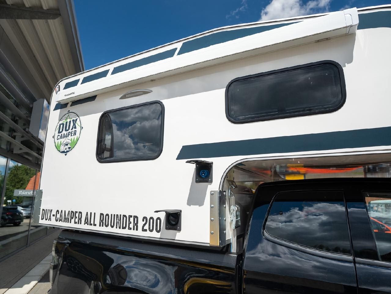 Fahrzeugabbildung Isuzu D-Max Space Cab 4WD LSE mit Dux Camper Wohnkabin