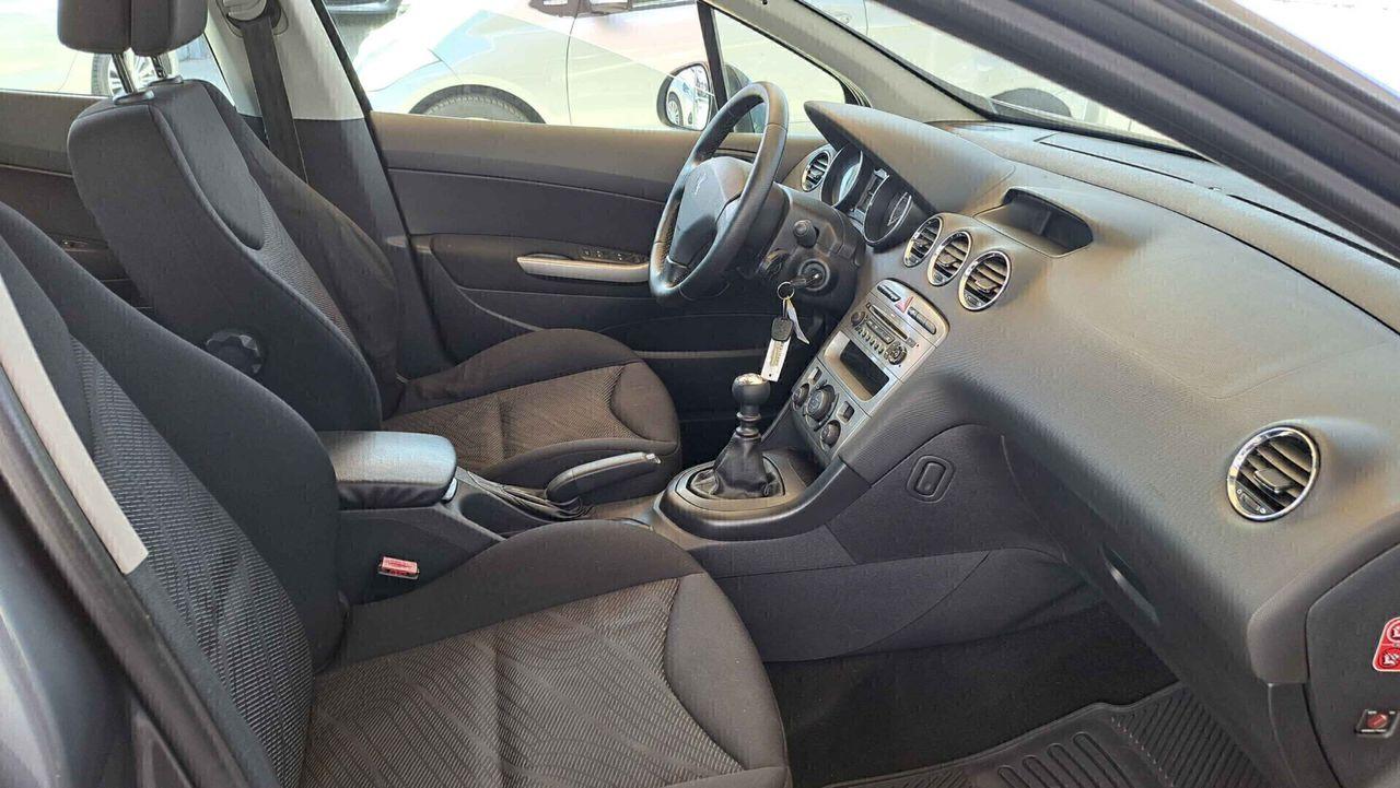 Peugeot 308 2009 — photo 15