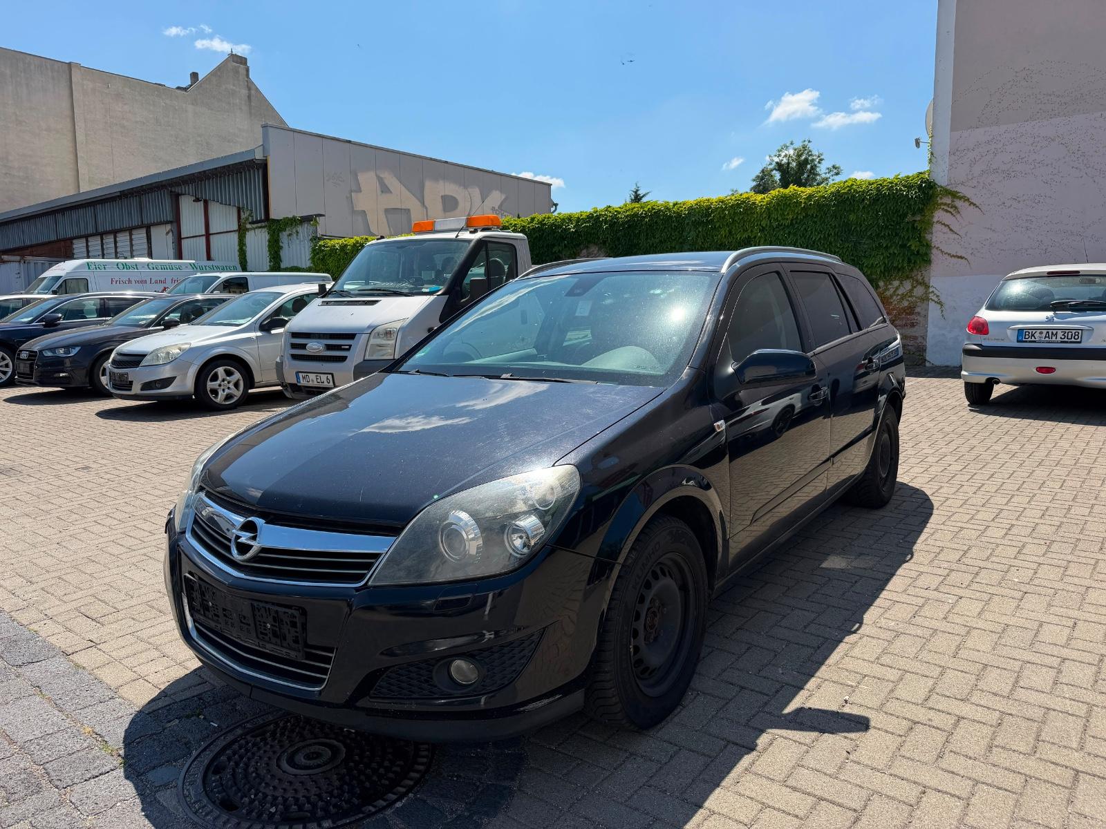Opel Astra 2009 — engine 1.364 cm³, 90 HP (66kW)