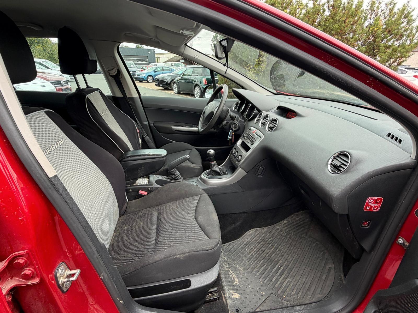 Peugeot 308 2012 — photo 16