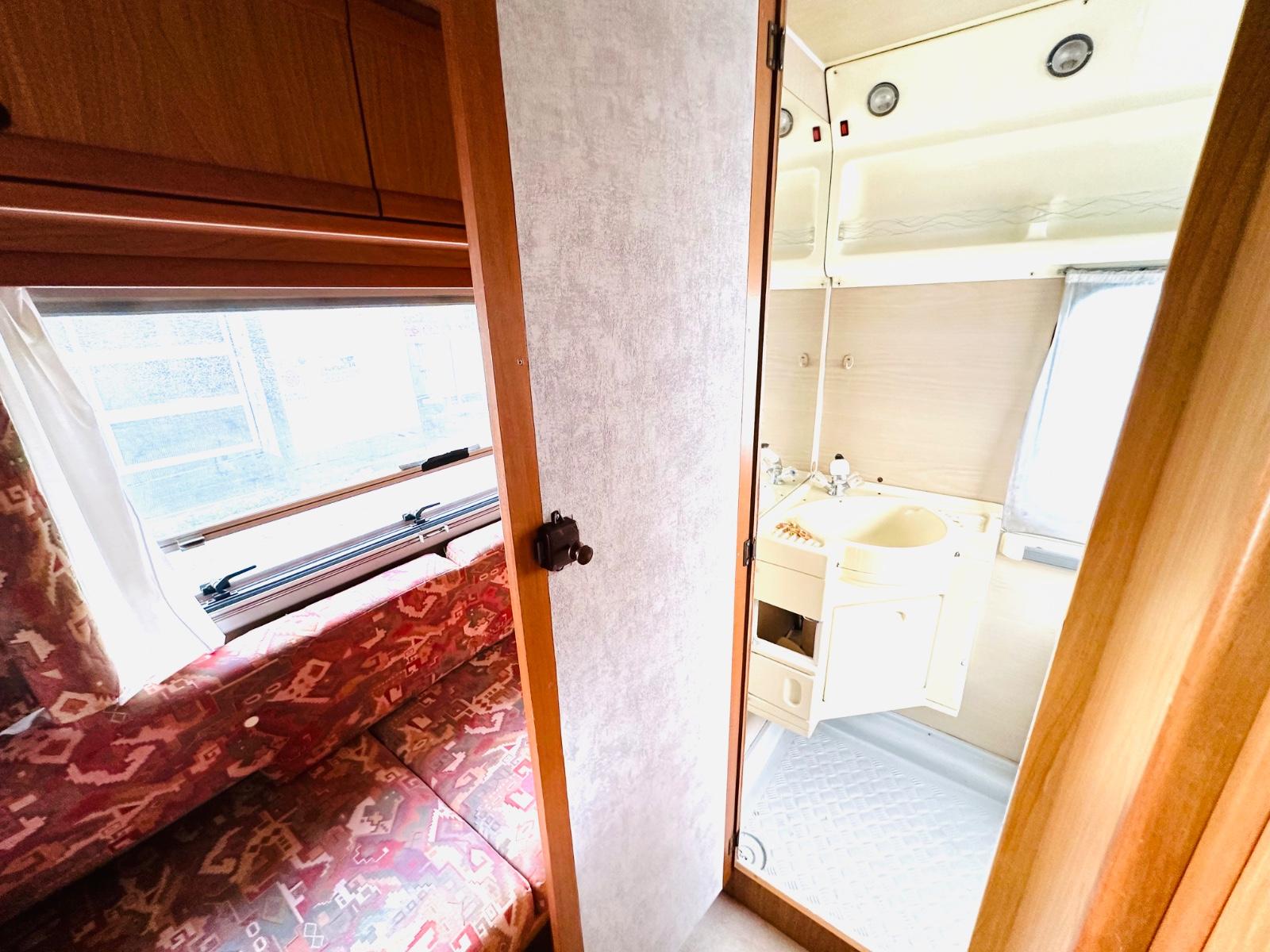Volkswagen T4 2.4 D Wohnmobil Tüv NEU+WC+Dusche+Küche