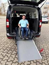 Ford Tourneo Connect mit Rollstuhlrampe und Heckaus. - Behindertengerechte Ford Tourneo Connect