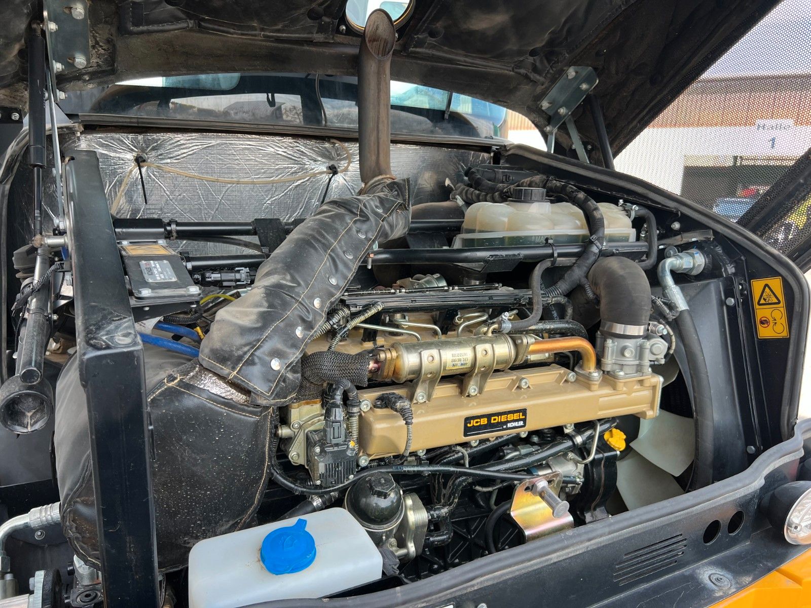 Fahrzeugabbildung JCB 409 SV / nur 2.496h / Klima Klappschaufel Gabel