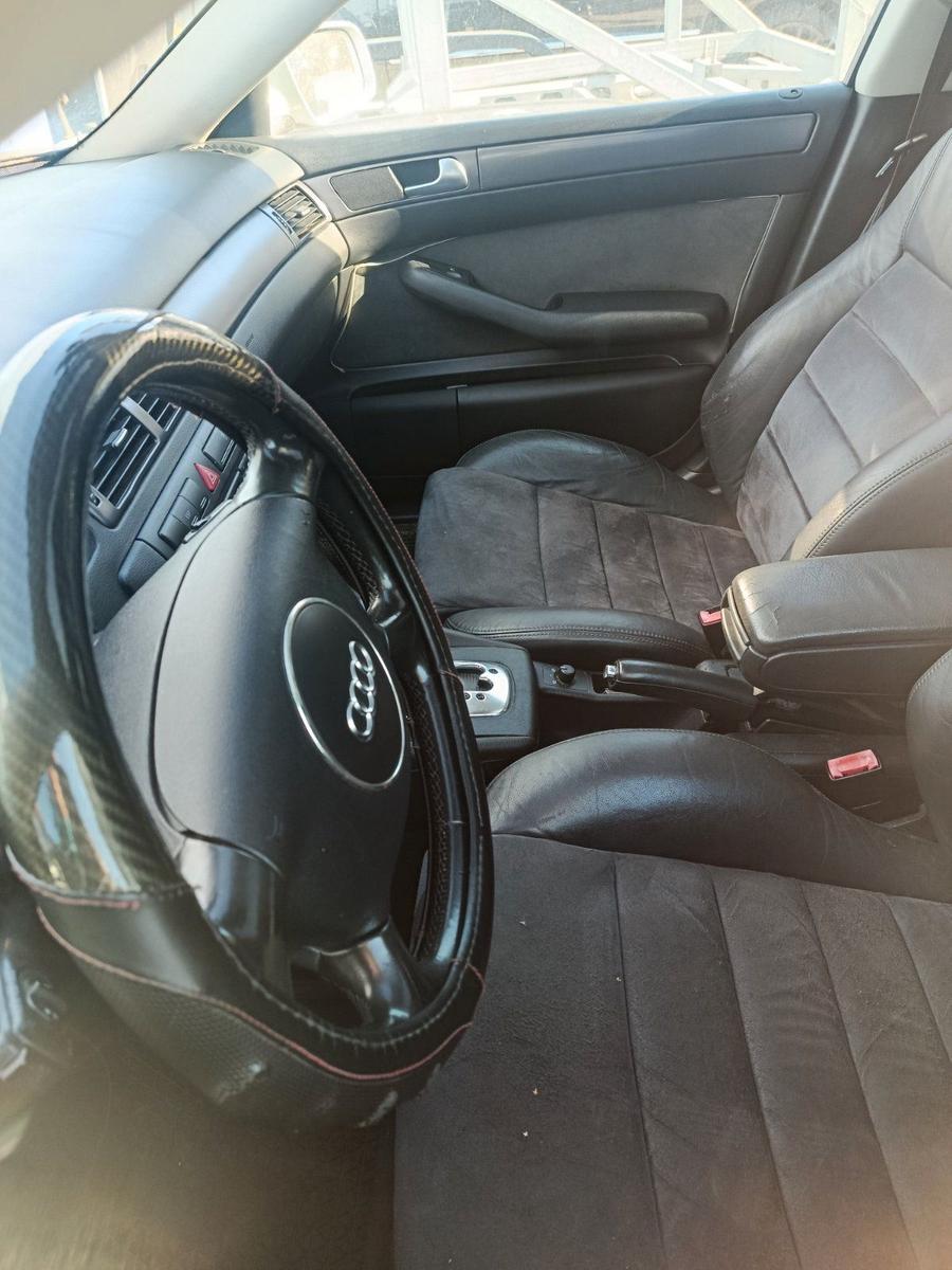 Audi A6 2004 — photo 9