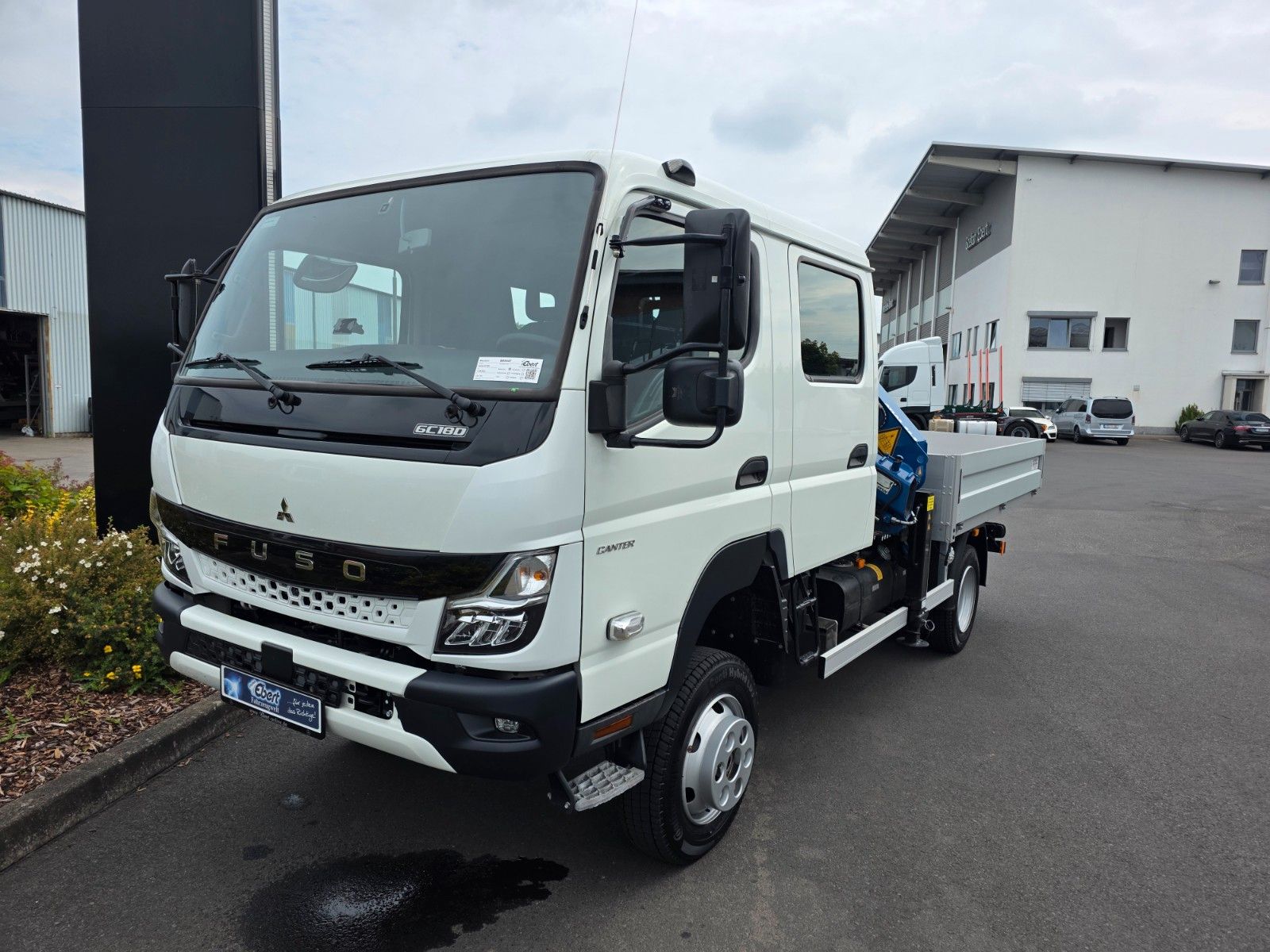 Fahrzeugabbildung Mitsubishi Fuso Canter 6C18D DoKa 4x4 Kran Atlas 65.2 - A2