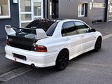Mitsubishi Lancer EVOLUTION VII - Mitsubishi Lancer: Vi Evolution