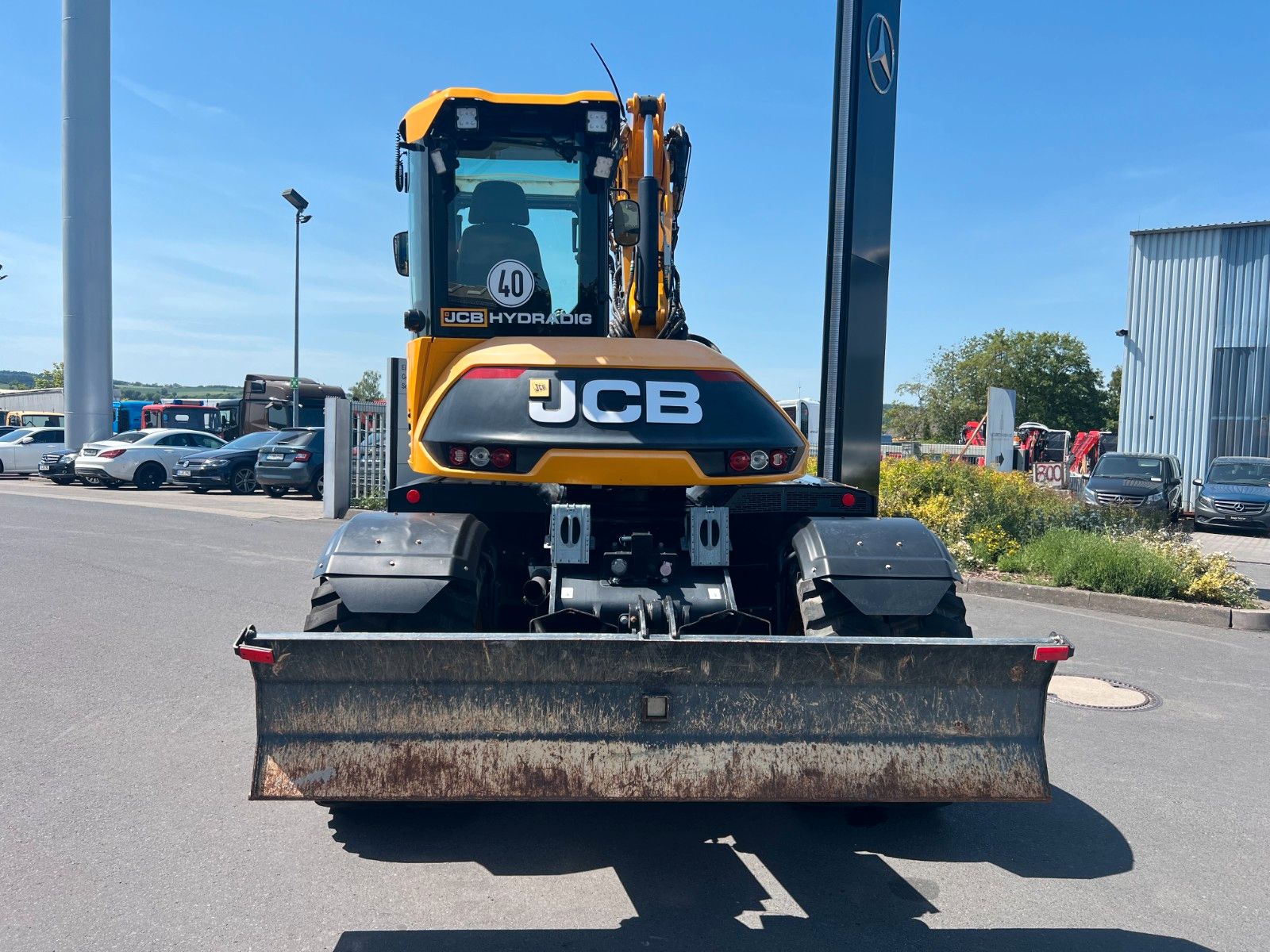 Fahrzeugabbildung JCB Hydradig 110W / Pratzen / nur 179h / Löffelpaket