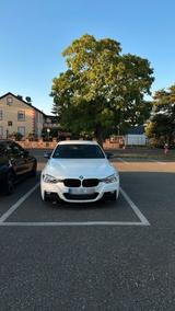 BMW 330d mit Tieferlegung und Harman Kardon - BMW 330 aus 2013 mit Diesel-Antrieb: Limousine