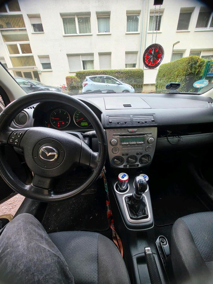 Mazda 2 2006 — photo 7
