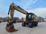 CAT M 320 F - CAT Mobilbagger M320