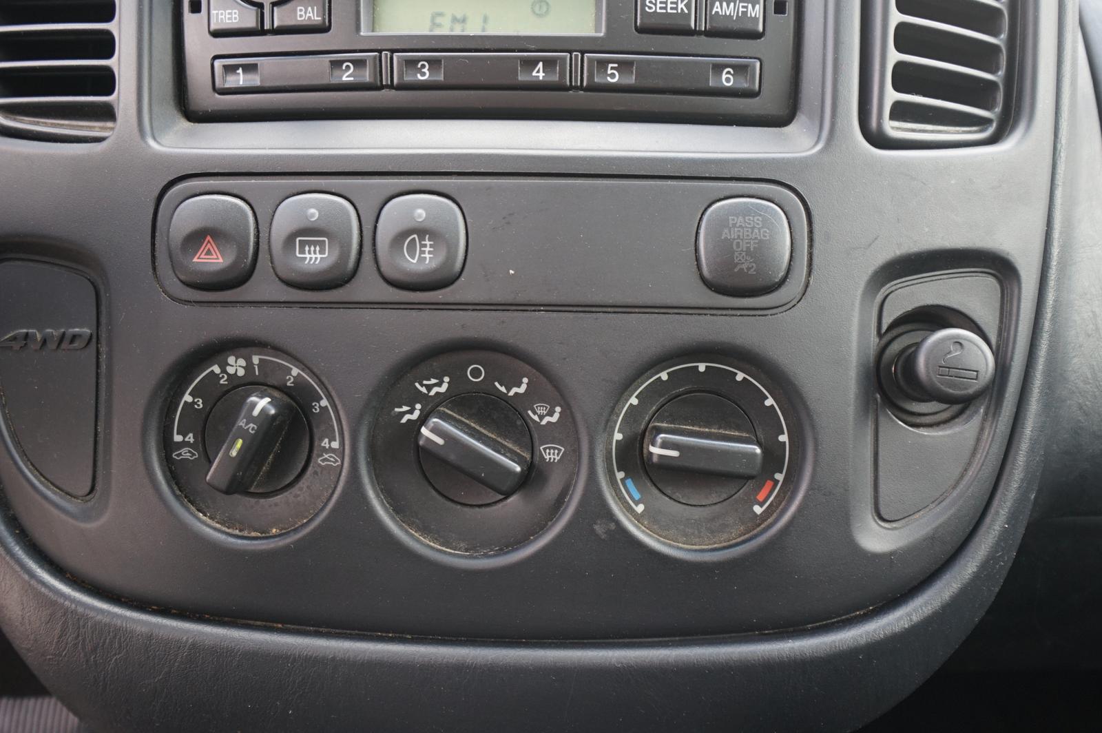Ford Maverick 2005 — photo 25