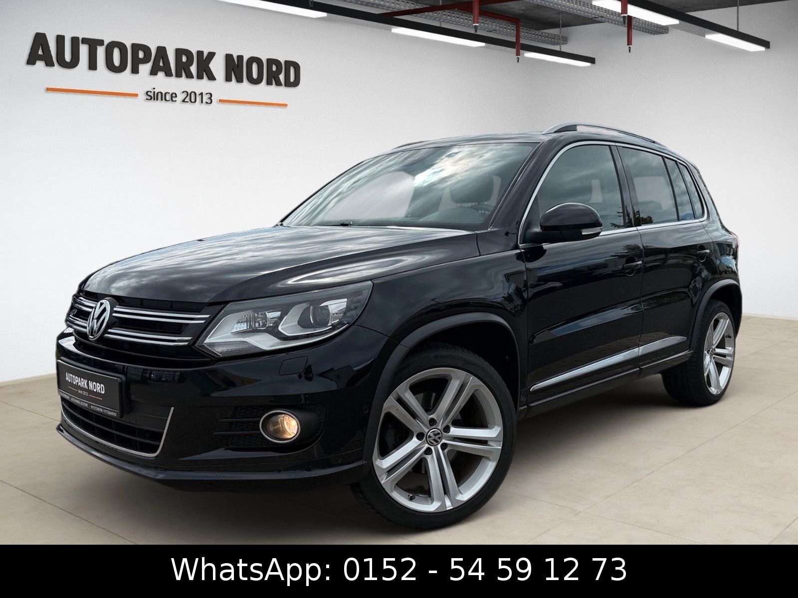 Volkswagen Tiguan - 1