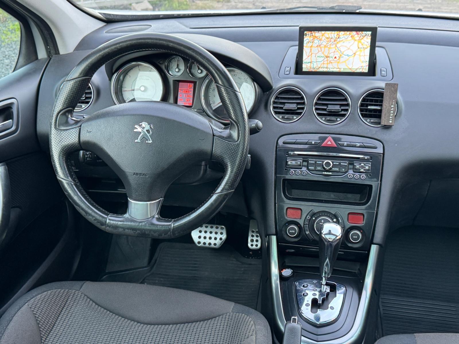 Peugeot 308 2014 — photo 16