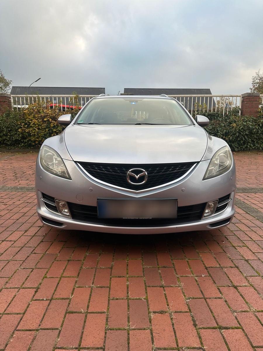 Mazda 2 2008 — вигляд ззаду