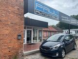 Kia Carens 2.Hand! S-Heft! Tempo.! AHK! - blaue Kia Carens