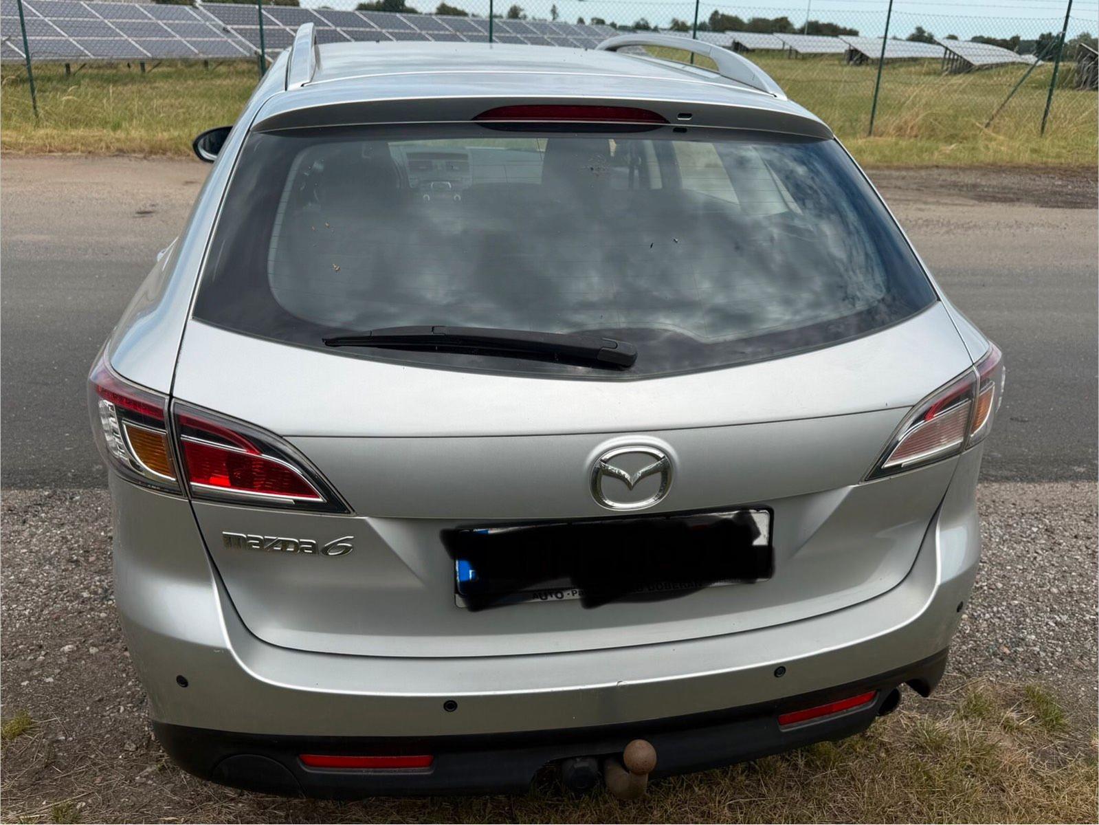 Mazda 2 2011 — photo 8