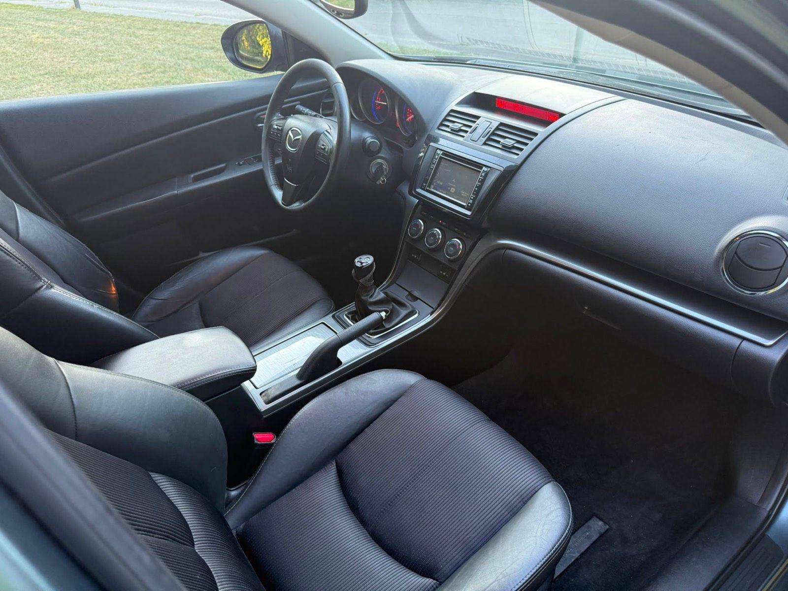 Mazda 2 2012 — photo 11