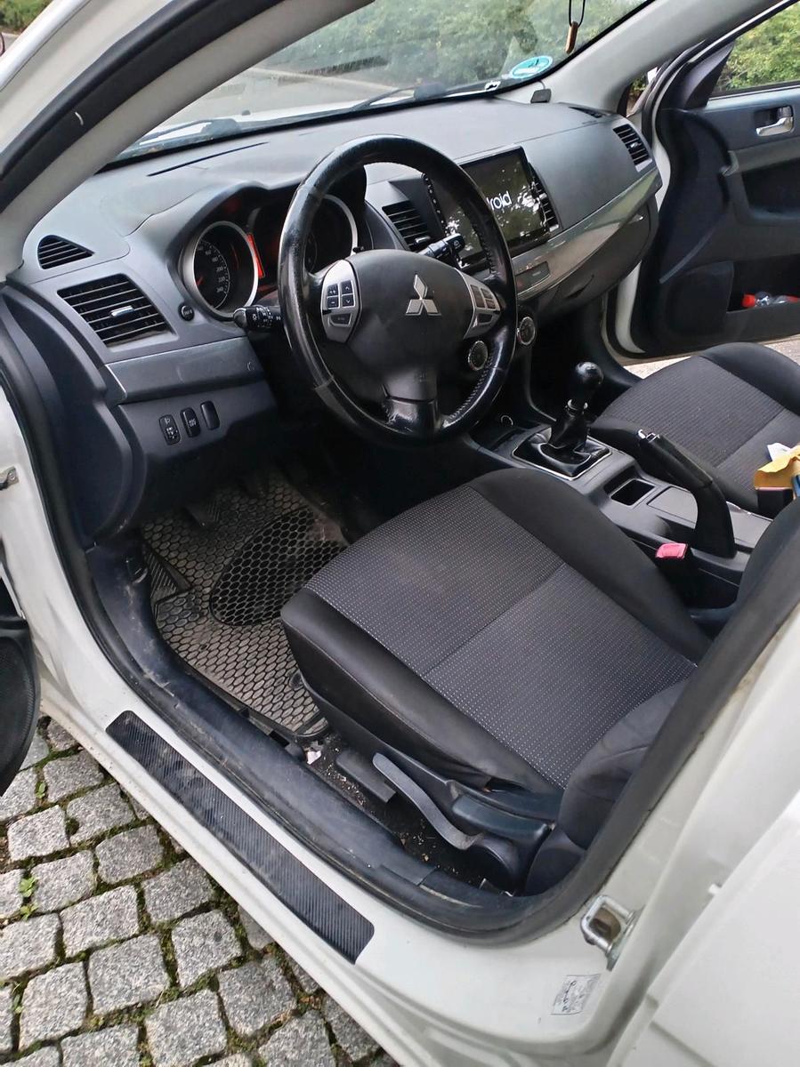 Mitsubishi Lancer 2010 — photo 13