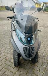 Piaggio MP 500 LT Business / Sport - PIAGGIO ROLLER 50