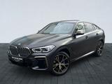 BMW X6 M50i SKYLo TV NightVi B/W StHz Massage IcGlow - BMW X6 M50 aus 2022