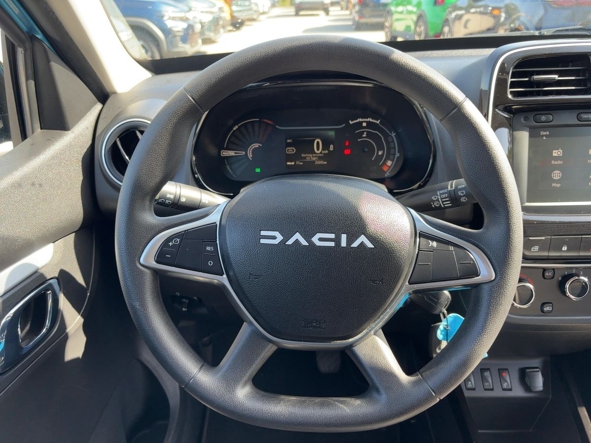 Fahrzeugabbildung Dacia Spring Expression 45 Navi Kamera - mit KI generiert/bearbeitet