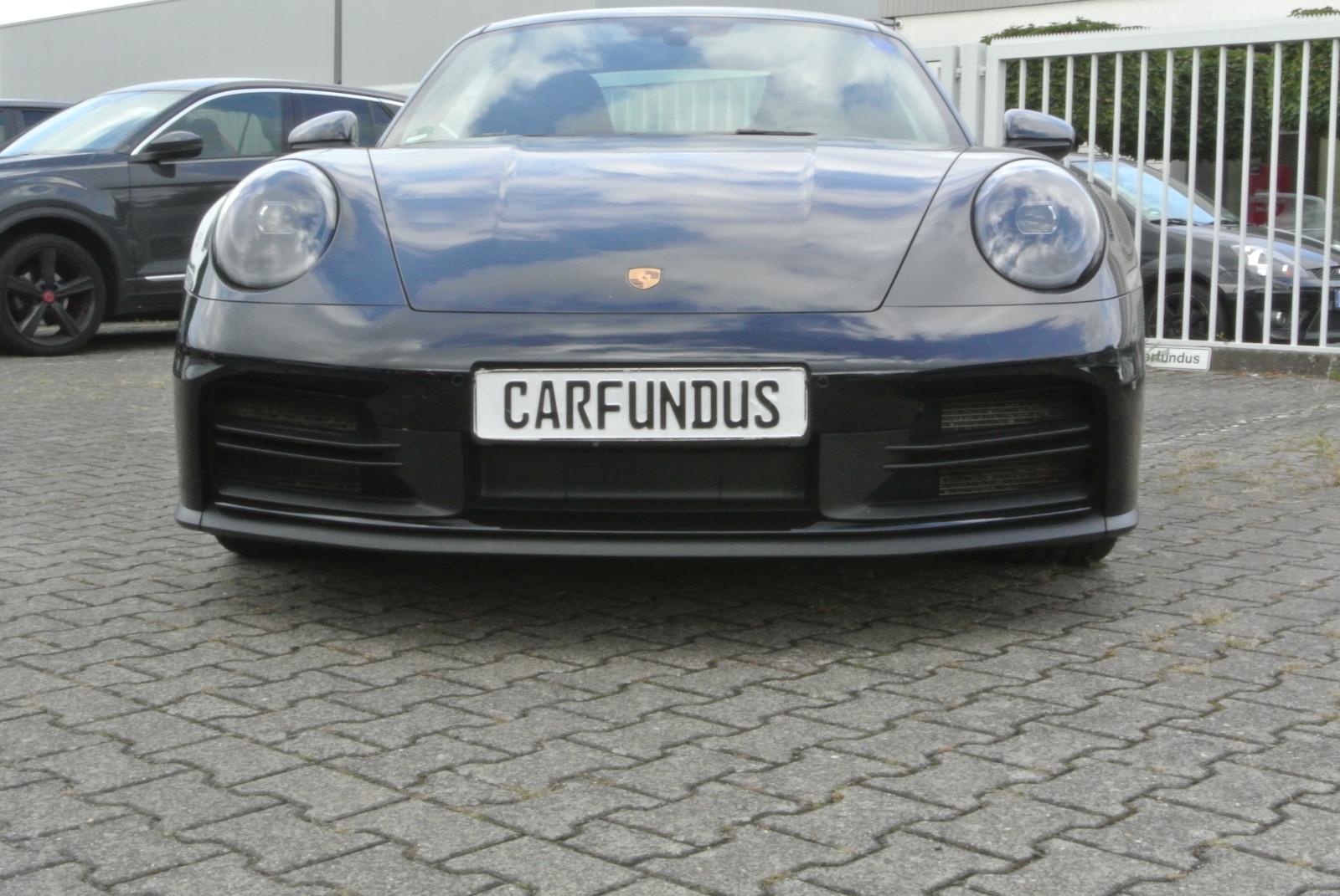 Porsche 992.2 coupe, mod 2025, schw/schw,abgas,bose,21",