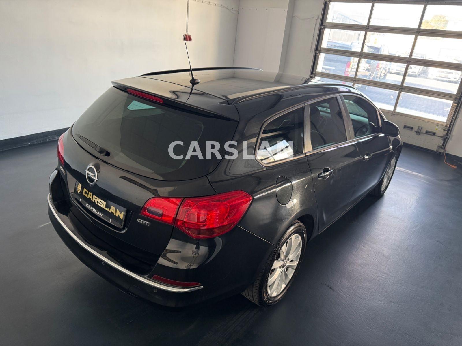 Opel Astra 2013 — photo 16