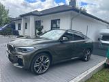 BMW X6 M50 M50i  BMW Garantie Vollausstattung - BMW X6 M50 Benziner Gebrauchtwagen