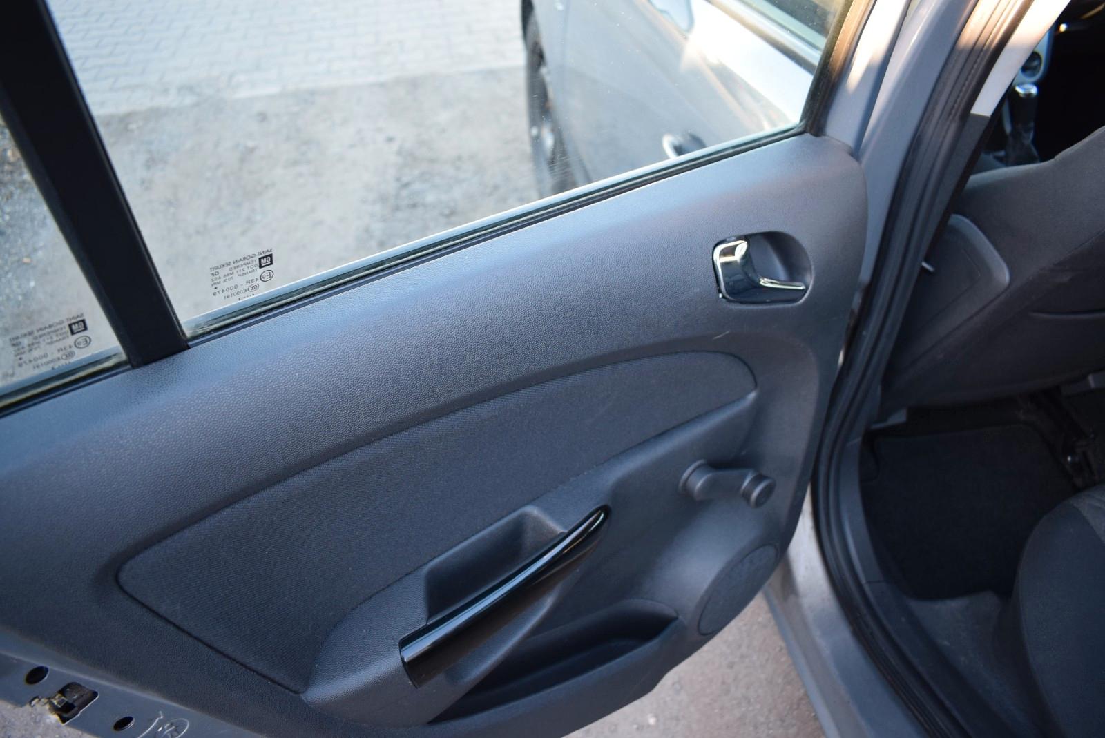 Opel Corsa 2013 — photo 16